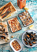 Appetiser tableau with various shellfish dishes
