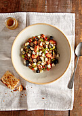 Lentil salad with peppers, blueberries and feta cheese
