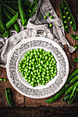 Old-fashioned plate of fresh peas