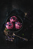 Raspberry ice cream scoop with lilac