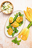 Zucchini flowers stuffed with goat cheese and basil
