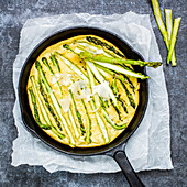 Spicy green asparagus frittata baked in a Cast Iron Pan
