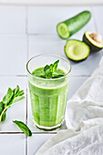 Green smoothie with avocado, cucumber and mint