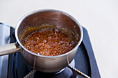 Prepare crème caramel Caramel mixture in saucepan