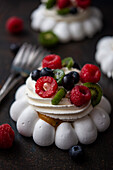 Mini pavlova with cream and fresh fruit