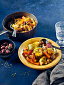 Tagine with mackerel, vegetables and olives