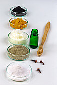 Essential oil,coconut oil,green cosmetic clay,bicarbonate and cloves