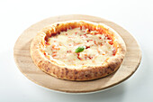 Margherita pizza against a white background