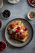 Crepes with raspberries and caramelized apples
