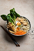 Ramen with soft-boiled eggs, Chinese cabbage, mushrooms and chicken