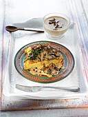 Potato omelette with Iberico ham and mushroom sauce