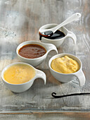Assorted sweet sauces - English cream, pastry cream, toffee sauce, caramel sauce