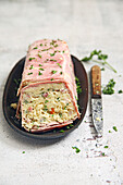 Fusilli terrine with bacon, cheddar cheese, tomatoes and cooked ham