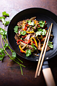 Wok with beef, peppers, onions and oyster sauce