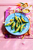 Small hot green peppers stuffed with cauliflower with turmeric