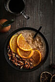 Porridge with almonds,confit oranges and raspberries