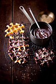 Waffles with melted chocolate and sesame