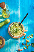 Courgette cream with crushed almonds and pistachios