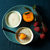 Sago pudding with lychees and persimmons