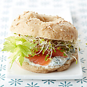Smoked salmon and sprout rice flour bagel sandwich