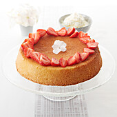 Sponge cake topped with strawberries