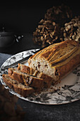 Sliced banana bread on a wooden chopping board