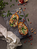 Squash stuffed with purslane,hazelnuts and pomegranate seeds