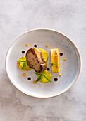 Pan-fried duck foie gras glazed with Sauternes,roasted mango with ginger and green meat passionfruit