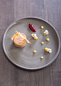 Foie gras terrine with sweetcorn,popcorn and pomeganate compote
