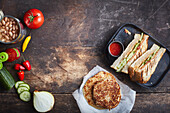 Akara bread sandwich with chicken, cucumber and tomato
