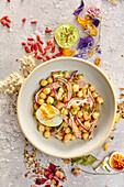 Chickpea salad with red onions, tuna and hard-boiled egg