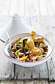 Chicken tagine with aubergines, olives and preserved lemons