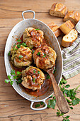 Cabbage stuffed with beef, sausage meat, carrots, tomatoes, bacon, chilli and coriander