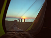 Campground on waterside at sunset, Canoe tour, Neuendorf, Fischland-Darss-Zingst Mecklenburg-Western Pomerania, Germany