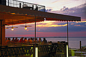 People on the terrace of a restaurant in the evening, Florida Keys, Florida USA, America