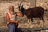 Alter Schweizer mit Ziege Tessin, Schweiz