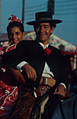 Paar bei der Feria de Abril Sevilla, Andalusien, Spanien