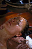 Woman during spa treatment with oil, Ayurveda, Sri Lanka, Asia