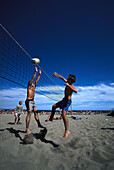 Men playing beach volley ball, Playa del Ingles, Gran Canaria, Canary Islands, Spain