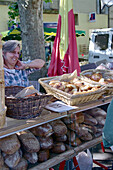 Woman sells Bread, Nyons, Drome France
