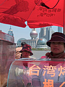 Woman selling food, Shanghai, China