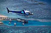 Helicopter over reef, Heron Island, Great Barrier Reef Queensland, Australia
