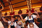 Oktoberfest revellers, Munich, Upper Bavaria, Bavaria, Germany