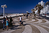 People on Tayalet promenade in the sunlight, Tel Aviv, Israel, Middle East, Asia
