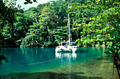 Boat at a lagoon in the sunlight, Blue Lagoon, Port Antonio, Portland, Jamaica, Caribbean, America