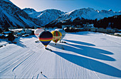 Hot-air balloons at the start, Lake Arosa, Arosa, Grisons, Switzerland