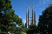 The towers of the cathedral Sagrada Familia under the blue sky, Barcelona Catalonia, Spain