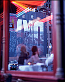 View at a eflection at Broadway and Houston Street, Manhattan, New York City, USA, America