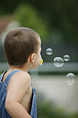 Boy making soap-bubbles, Boy making soap-bubbles, Boy making soap bubbles, people