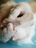 Woman washing hands, Vienna, Austria